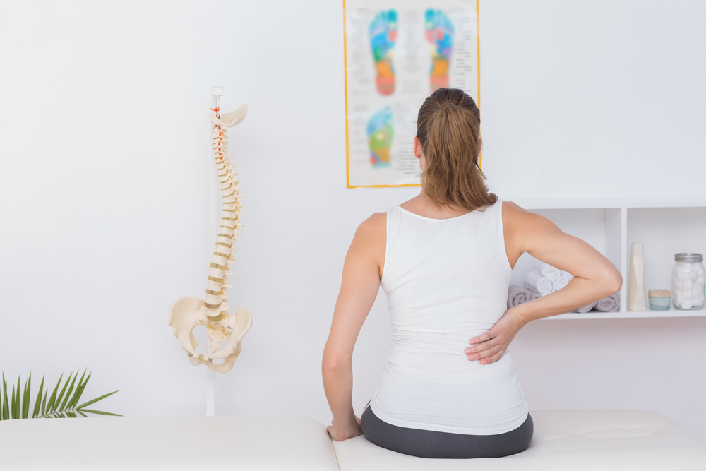 Причины болей в спине после родов и методы их устранения