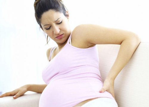 Как справиться с болью в копчике при беременности