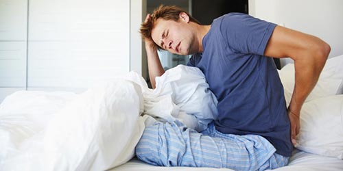 Почему после сна появляются боли в области спины?