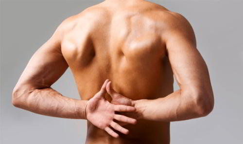 Причины боли в спине в области выше поясницы и ее лечение